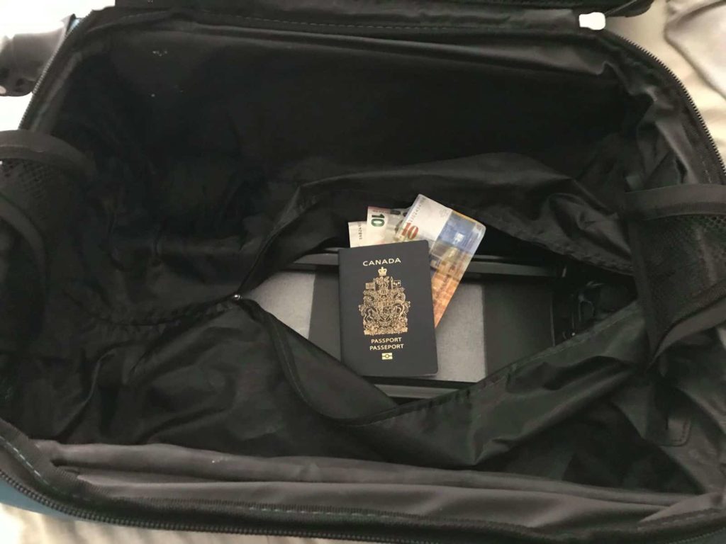 Travel safety: your person and your belongings - Passport Suitcase Bottom