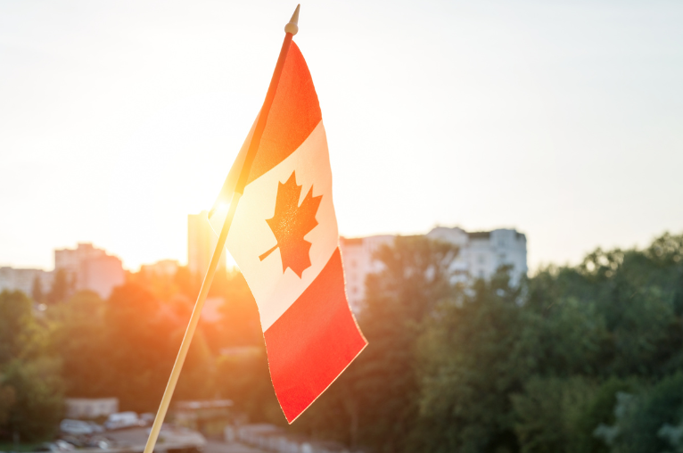 Best Credit Cards for Newcomers to Canada - Best CC for Newcomers Canada flag with sunset